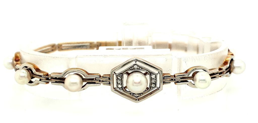 14ct Yellow and White Gold Pearl (6x4.5mm 1x 5.5mm) Diamond (old mine cut 7x 0.01ct) Bracelet (21652)